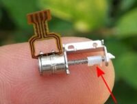 Micro stepper motor with driven screw